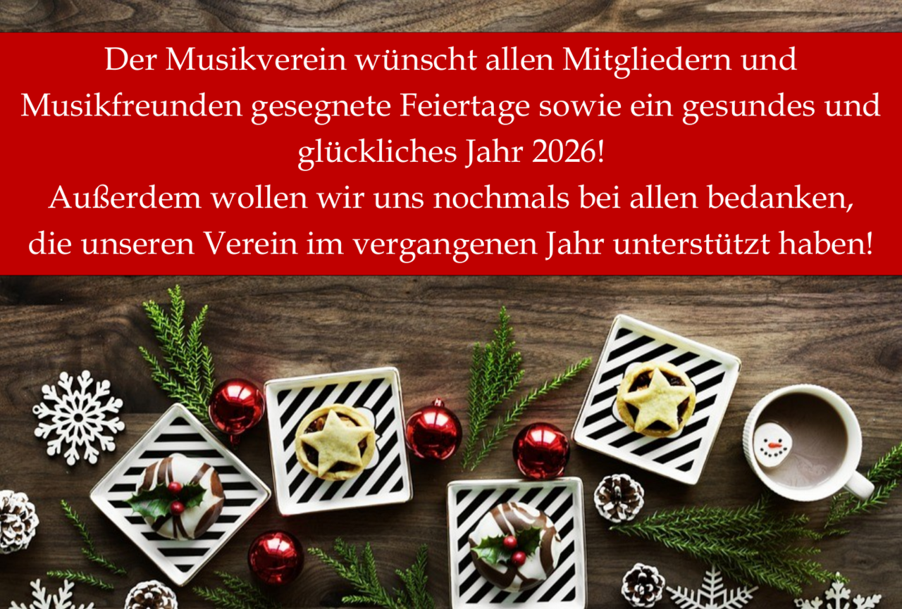Weihnachtliche Dekoration mit Text im Vordergrund: "Der Musikverein wünscht allen Mitgliedern und Musikfreunden gesegnete Feiertage sowie ein gesundes und glückliches Jahr 2026! Außerdem wollen wir uns nochmals bei allen bedanken, die unseren Verein im vergangenen Jahr unterstützt haben!"